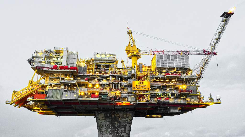 Offshore oil and gas platform representing energy logistics for import and export services in Hamad Port.