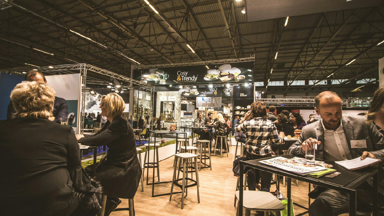 Networking at a Global Trade Show, Highlighting the Seamless Logistics Behind Event and Exhibition Materials