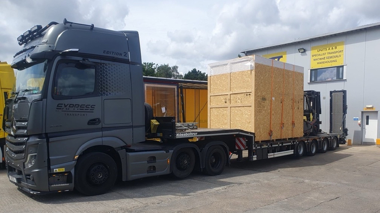 Oversized Cargo Transported on a Specialized Vehicle for Global Import and Export Solutions