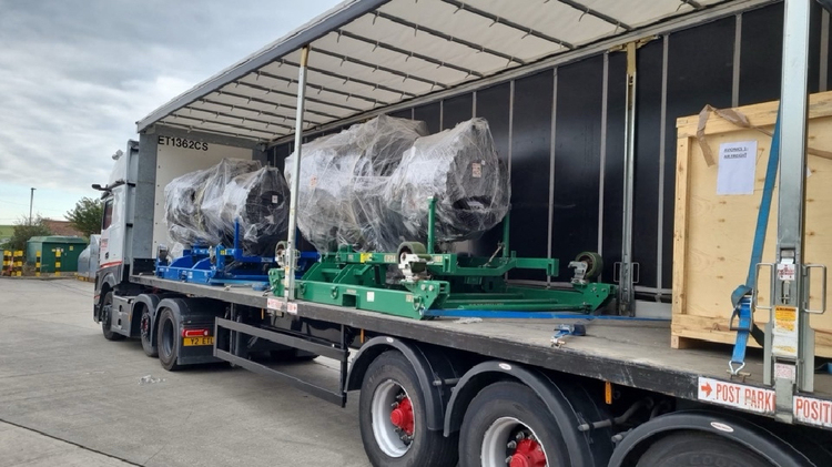 Oversized Industrial Machinery Being Transported on an Out-of-Gauge Cargo Vehicle for Global Delivery