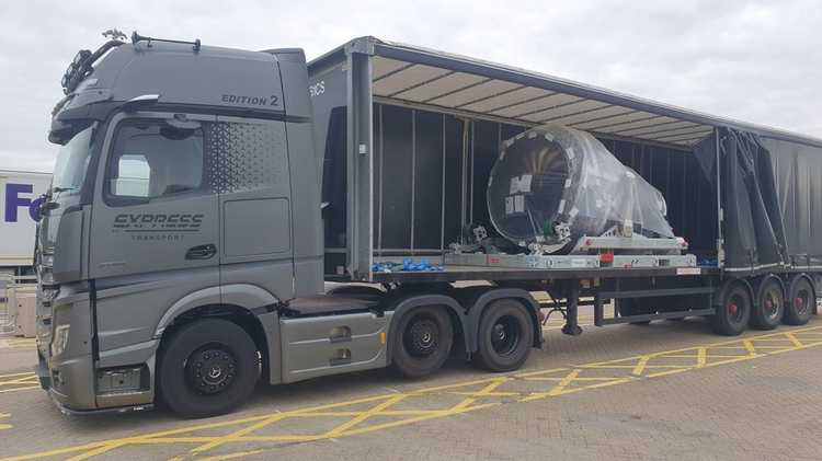 Aircraft Spare Parts Being Transported on a Specialized Truck for Global Delivery
